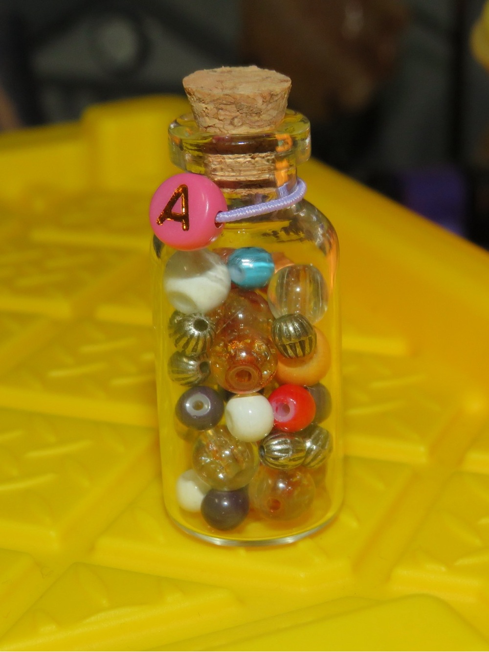 Initial A potion bottle